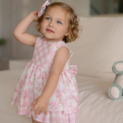 VESTIDO BRAGUITA BEBE FLORES ROSA - Menta Moda Infantil
