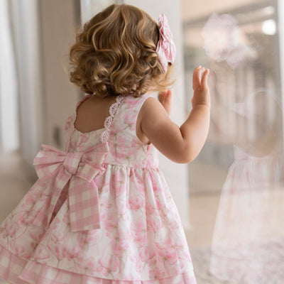 VESTIDO BRAGUITA BEBE FLORES ROSA - Menta Moda Infantil
